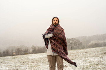 man in snow mountains and winter