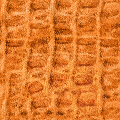 Seamless 4k photo texture material of light brown colored reptile embossed suede leather.