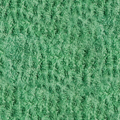 Seamless 4k photo texture material of green colored embossed reptile pattern suede leather.