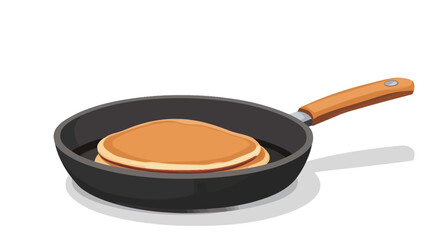 A high-angle, close-up studio shot against a white background depicts two golden-brown pancakes cooking in a dark-grey frying pan with an orange handle. The pancakes are stacked slightly off-center