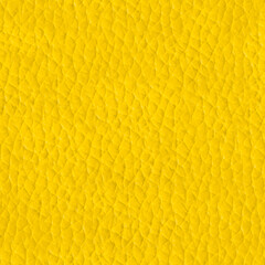 Seamless 4k photo texture material of yellow colored soft leather.