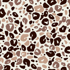 Leopard skin, dark spots on a light background. Abstract, seamless pattern. Suitable for covers, textiles, backgrounds, packaging paper.
