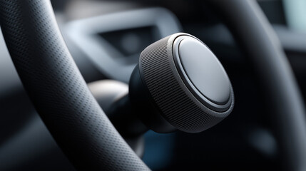 Close-up view of a modern car steering wheel with a sleek control knob, showcasing intricate textures and materials, emphasizing automotive design and functionality