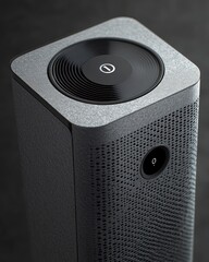 Obraz premium Close-up of a gray, square, textured smart home device