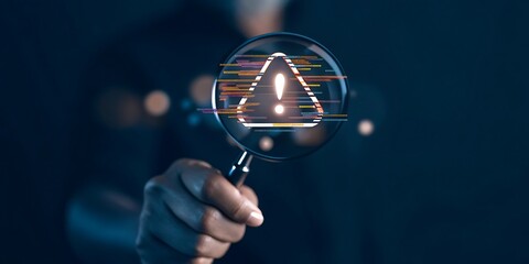 Hand interacting with futuristic digital icons representing risk management and safety on a dark background, digital security concept with warning notifications on virtual screens.