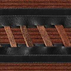 Seamless 4k photo texture material of black leather striped surface with suede lacing on brown cloth.