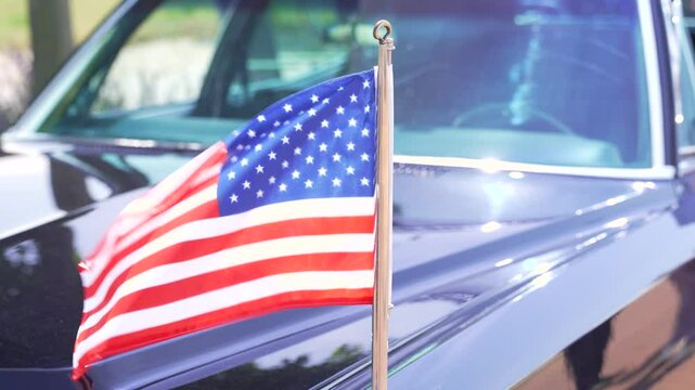 United States Flag on Limousine, American Flag on Luxury Car Waving in the Wind