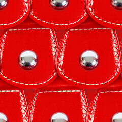 Seamless 4k photo texture material of scaly red polished leather armor surface with rivets.