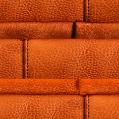 Seamless 4k photo texture material of light brown folded leather surface with seams.