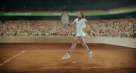 Woman tennis player playing tennis in professional tennis stadium.