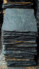 Stack of dark slate stones for construction or decoration
