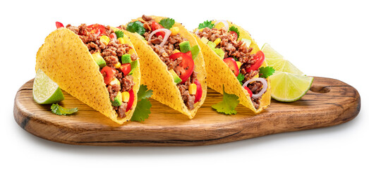 Mexican meat tacos or beef stuffed tortillas on wooden serving board. File contains clipping path.