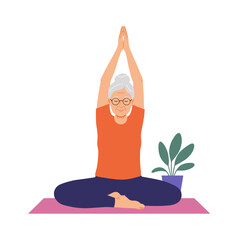 Elderly woman practicing yoga with hands raised on mat indoors  