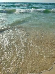 Sunny Beach Scene with Sand and Clear Sky