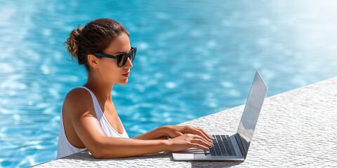 photo of woman, dynamic angle working on laptop poolside