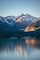 Stunning mountain landscape with reflections at sunrise.
