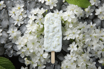 A Refreshing Frozen ice cream Surrounded by Delicate White Flowers and Ice, Perfect for a Summer Indulgence and Aesthetic Presentation