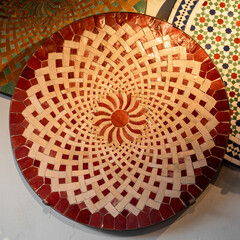 Three beautiful round table tops in ceramic, shot from above
