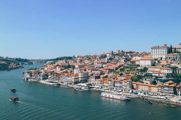 panorama of the old town of porto and duoro river on blue sky day
