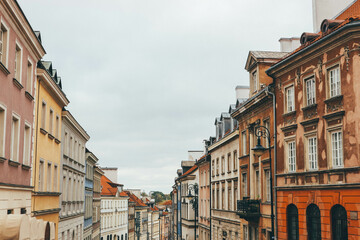old colorful houses in main old square facades in warsaw
