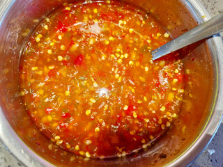 thai seafood sauce in a bowl, top view.