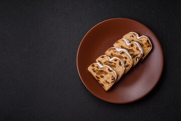Christmas Stollen, a German sweet cake with marzipan and fruit. Winter Christmas Stollen