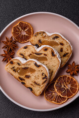 Christmas Stollen, a German sweet cake with marzipan and fruit. Winter Christmas Stollen