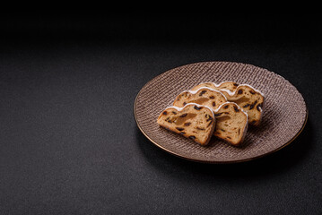 Christmas Stollen, a German sweet cake with marzipan and fruit. Winter Christmas Stollen