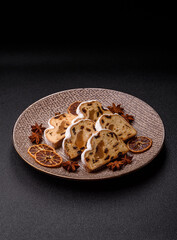 Christmas Stollen, a German sweet cake with marzipan and fruit. Winter Christmas Stollen