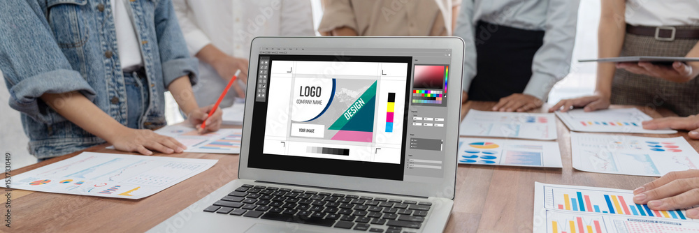Poster graphic designer software for modern design of web page and commercial brisk ads showing on the comp