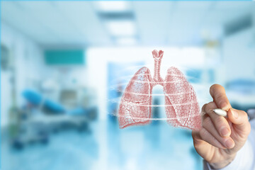 Doctor examines lungs in a modern medical facility.