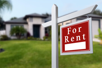 Home for rent. Sign in front of new home.