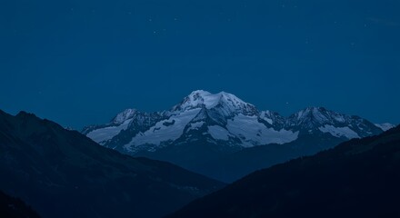 Majestic Snow-Capped Mountain Peak at Dusk A Breathtaking View