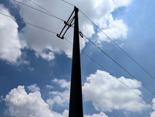 power lines against blue sky
