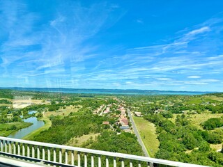 summer landscape from a bird's eye view with a view of Lake Balaton in the distance, photo by a traveler. High quality photo