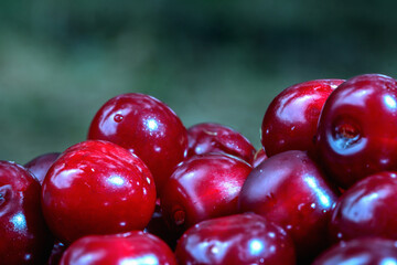 ripe, red cherries on a blurred background