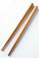 Two polished wooden chopsticks, isolated on white , pair, tableware, cuisine