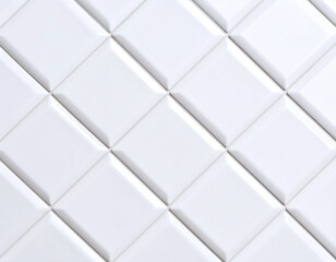 Fototapeta premium Close-up of a glossy white tiled surface with a diamond pattern and raised edges