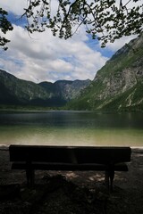Bench with a view of Lake Bohinj and surrounding mountains, Slovenia