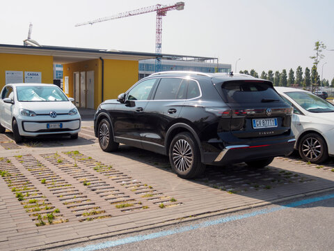 black tofas suv car 2023 model parked in outdoor parking lot with other vehicles creating a automobile background during a bright sunny day