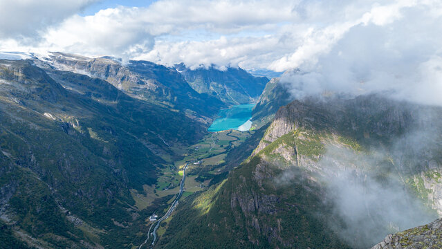 Glacier River Flowing from Briksdalsbreen Through Forested Valley