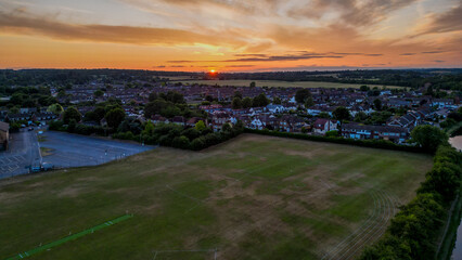 Aerial view of Hoddesdon, Hertfordshire showing river, sunset and housing estate