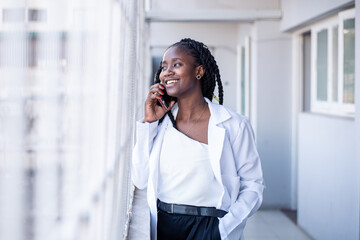 Mozambican black woman and Smartphone interaction