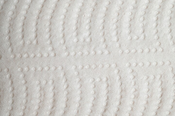 Closeup texture of embossed white paper
