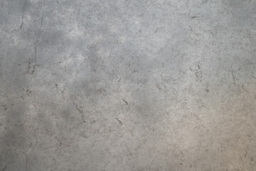Textured gray marble background with organic cracks
