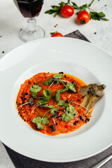 Georgian cuisine dish in a restaurant on a light background