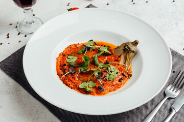 Georgian cuisine dish in a restaurant on a light background