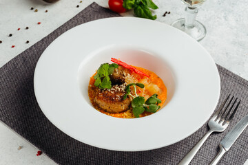 Georgian cuisine dish in a restaurant on a light background
