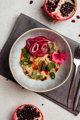 Georgian cuisine dish in a restaurant on a light background