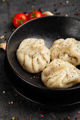 juicy golden grilled barbecue meat with spices on dark background